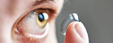 Contact lens on a fingertip
